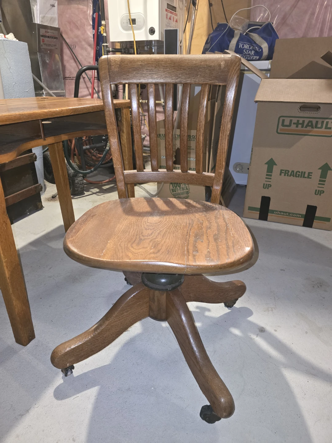Vintage wood school desk with wooden swivel chair