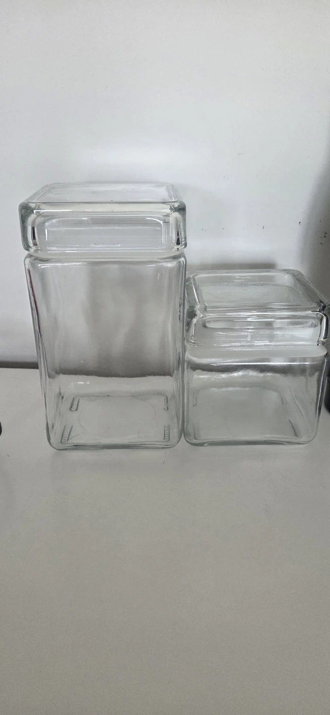 Set of 2 Clear Glass Canisters with Lids