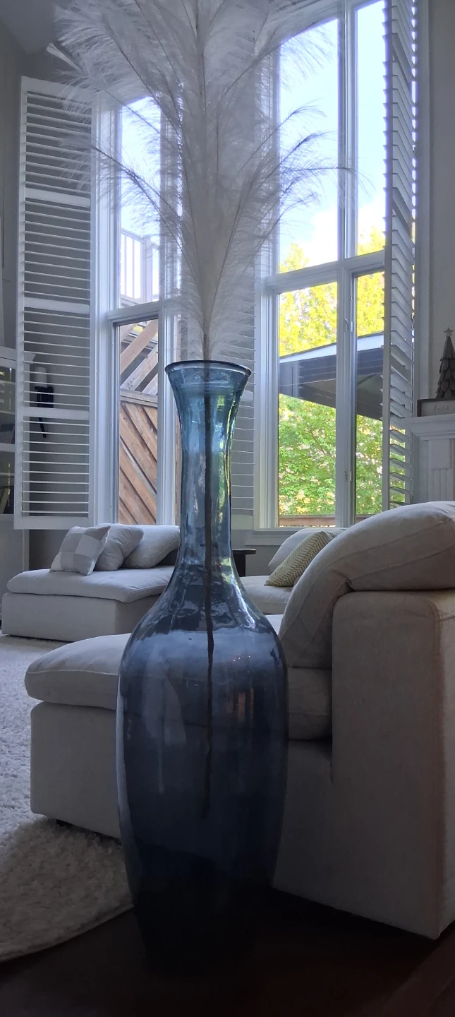 Large Blue Glass Vase with Tall White Feathers
