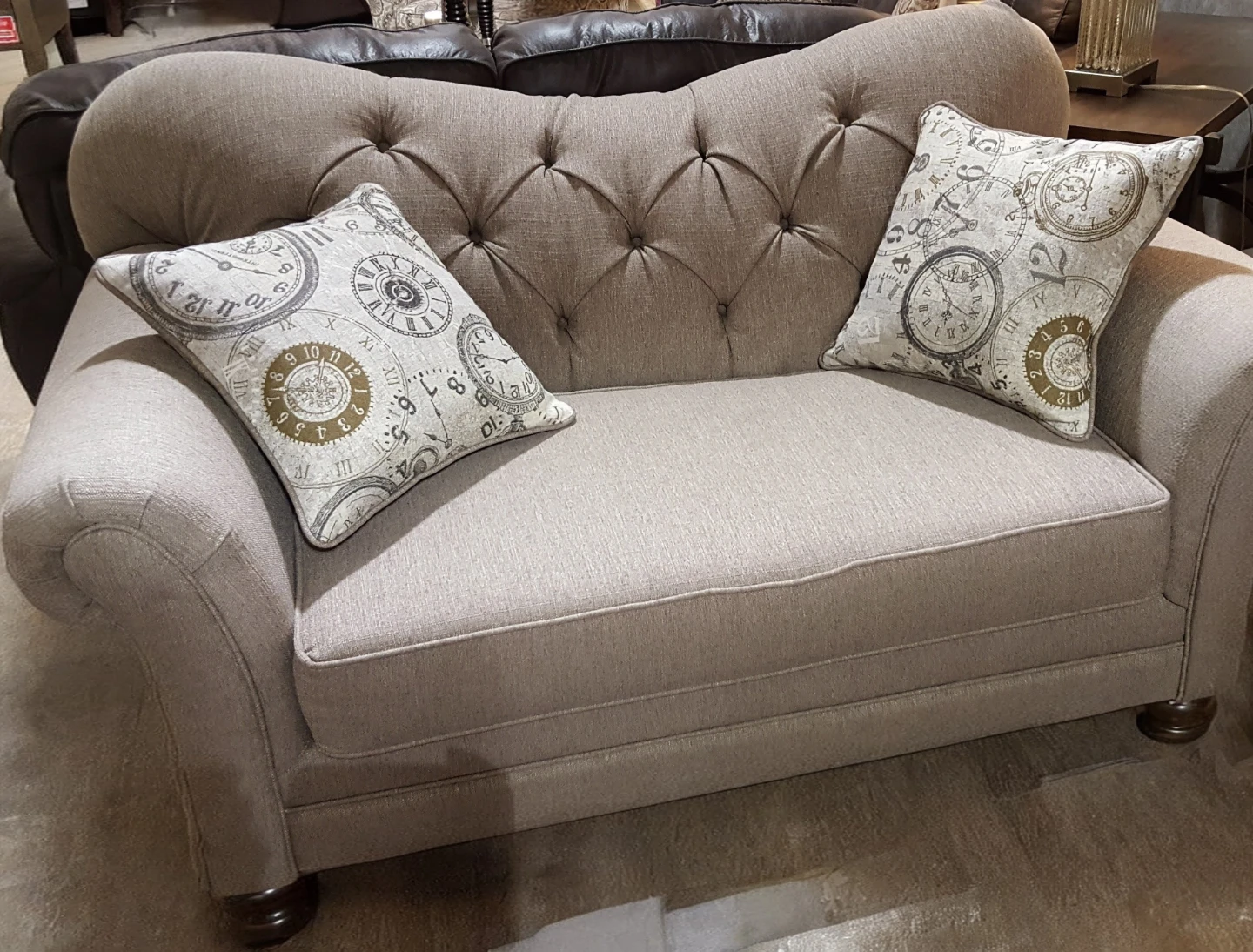Tufted Loveseat with Clock Pillows