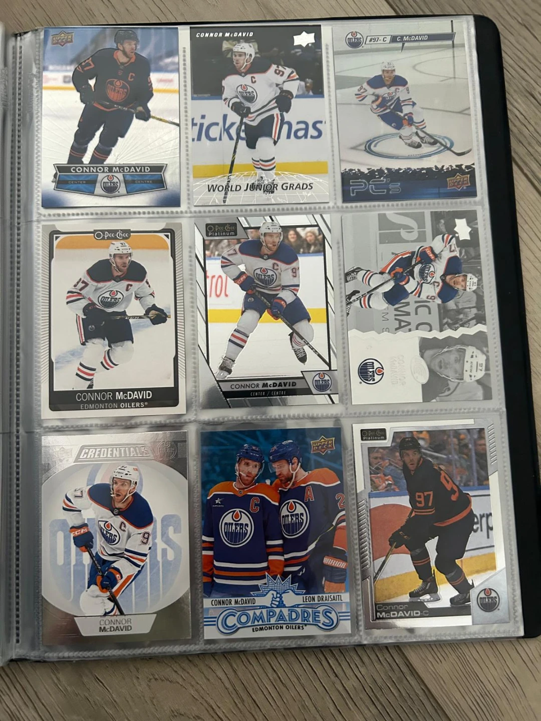 Connor McDavid hockey card collection in binder - photo 5