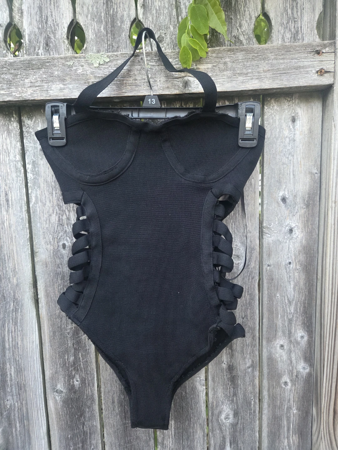 Fashion Nova Black Cut-Out One-Piece bodysuit