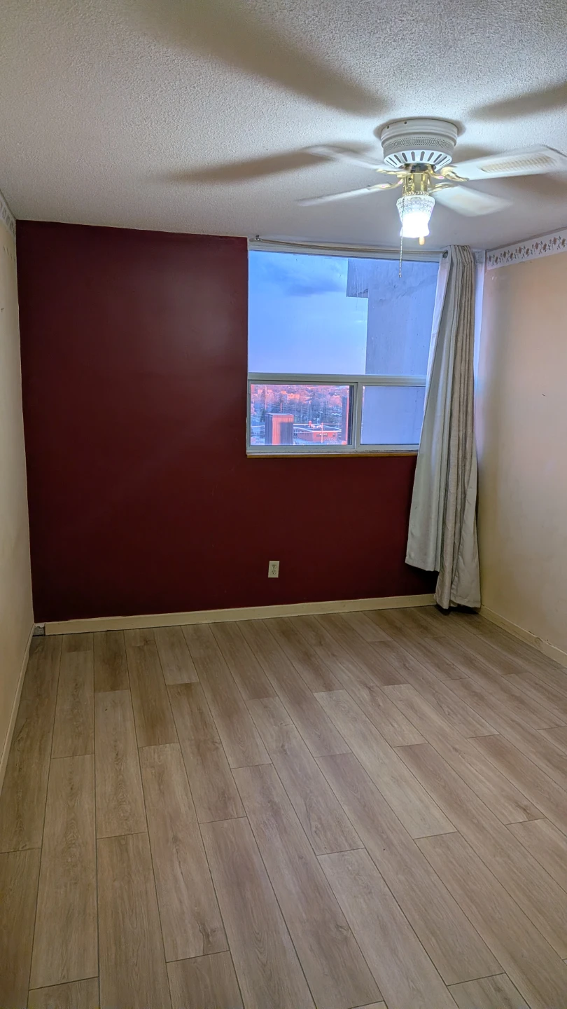 Bedroom with hardwood floors and closet - photo 4