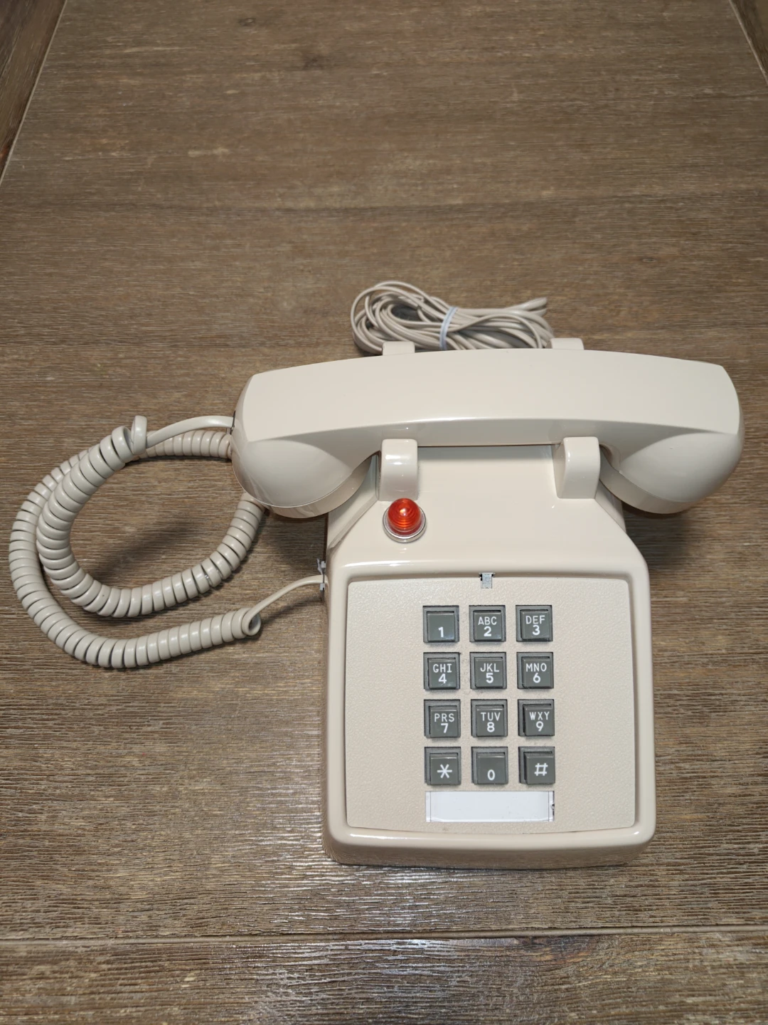 Hearing aid plane old telephone with red light notifier