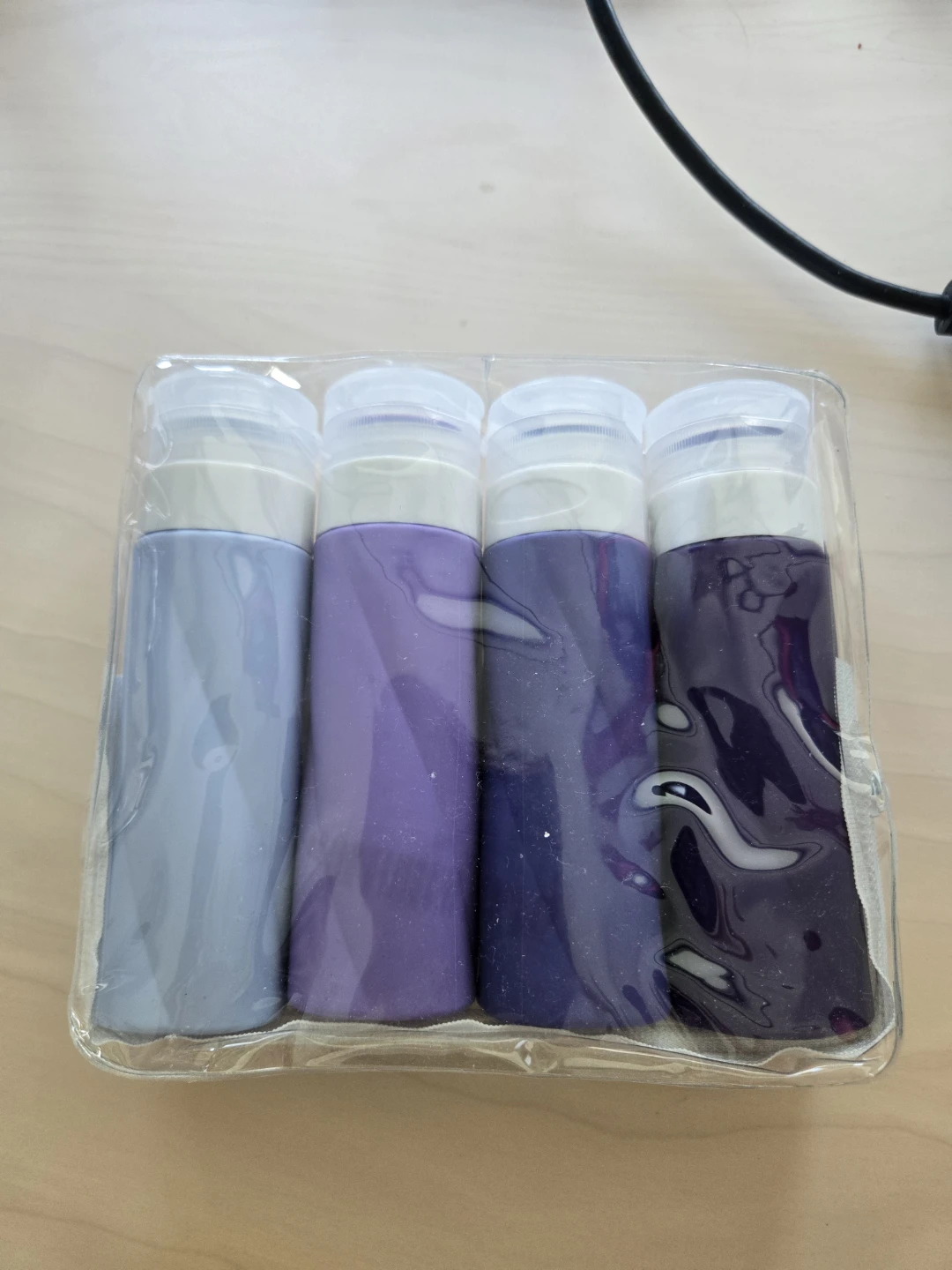 Set of 4 Travel Bottles - Purple Tones