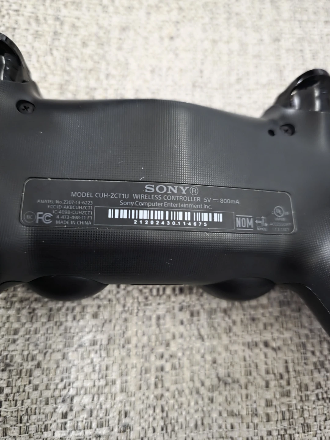 Sony PlayStation DualShock 4 Wireless Controller - Black - photo 2