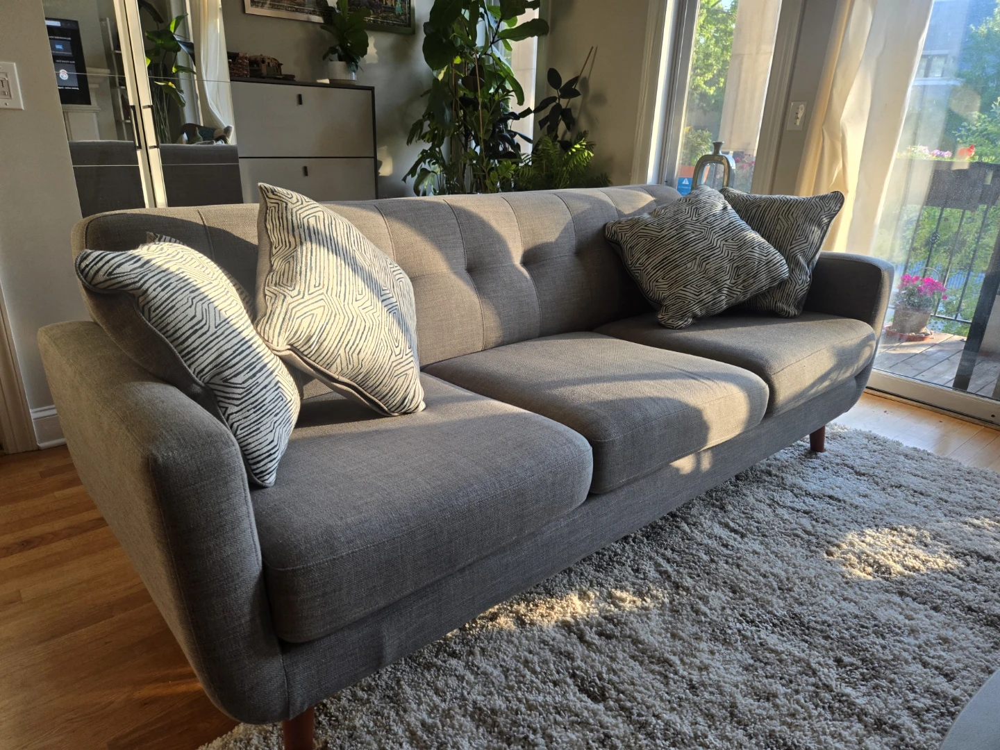 Modern Gray Sofa with Decorative Pillows