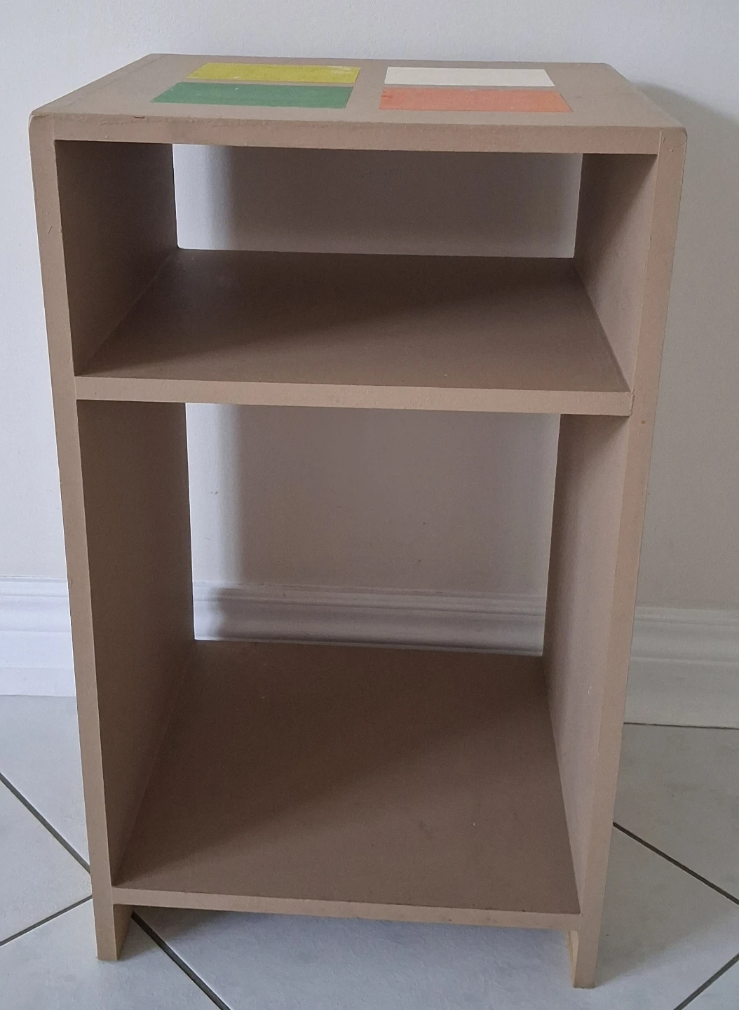 Two-shelf storage unit with decorative squares