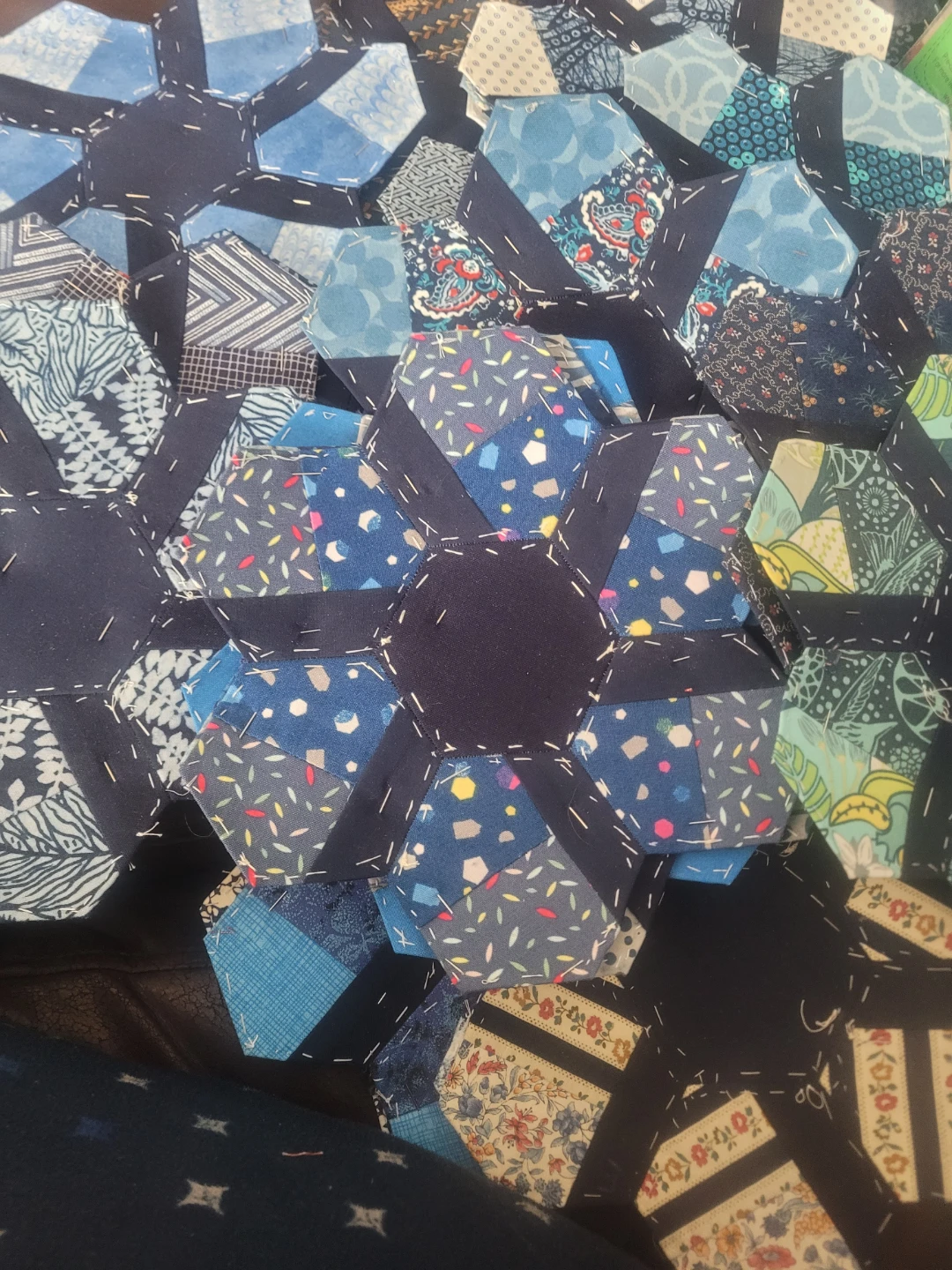 Pre-cut paper pieced Hexagons for quilt.