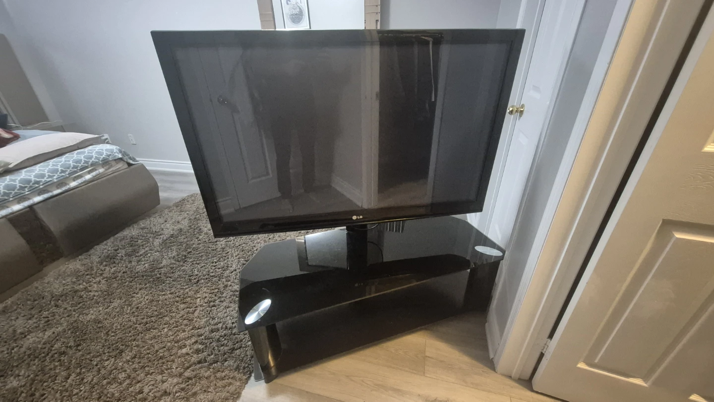 LG TV with Black Entertainment Stand