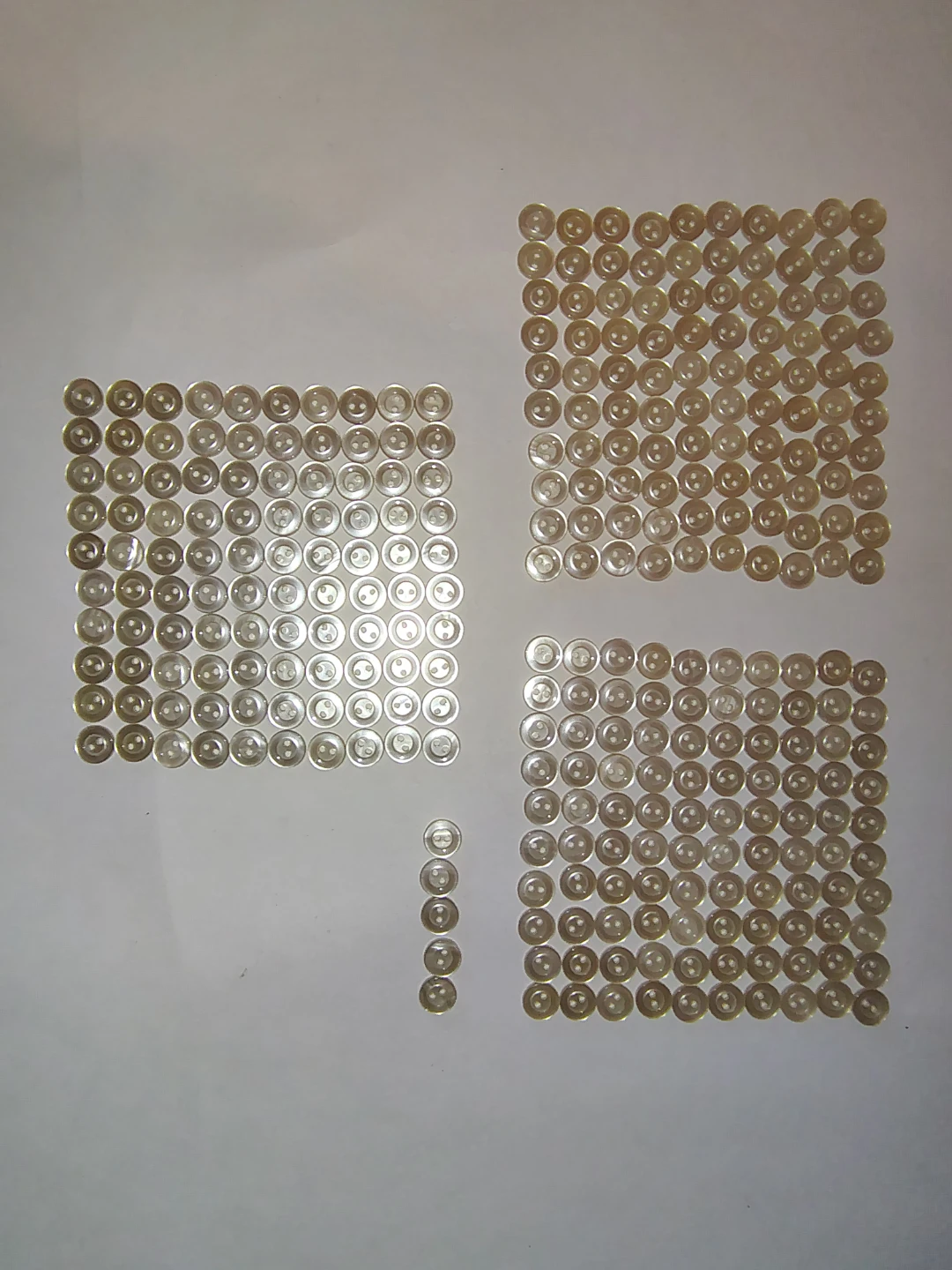 Set of 305 Pearly White Buttons