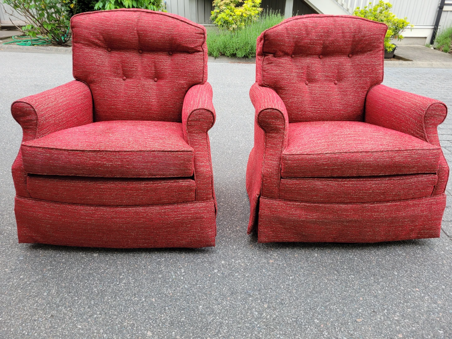 ​Pair of Jessica Charles Fabric Swivel Rocking Lounge Chairs.