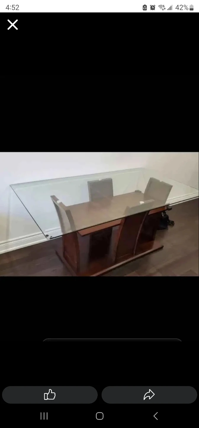 Glass top 6 to 8 chair dinning table