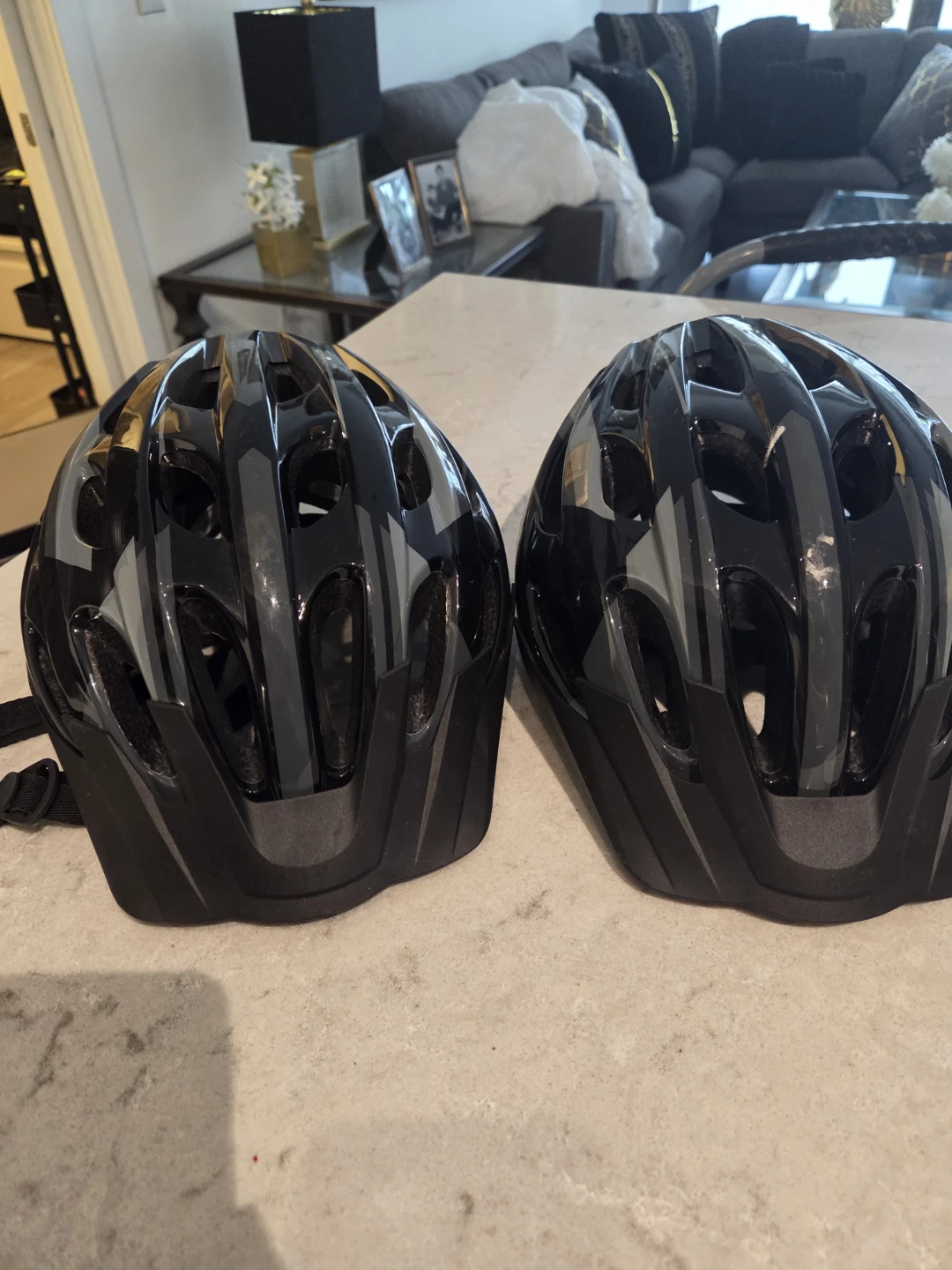 Two Black Cycling Helmets