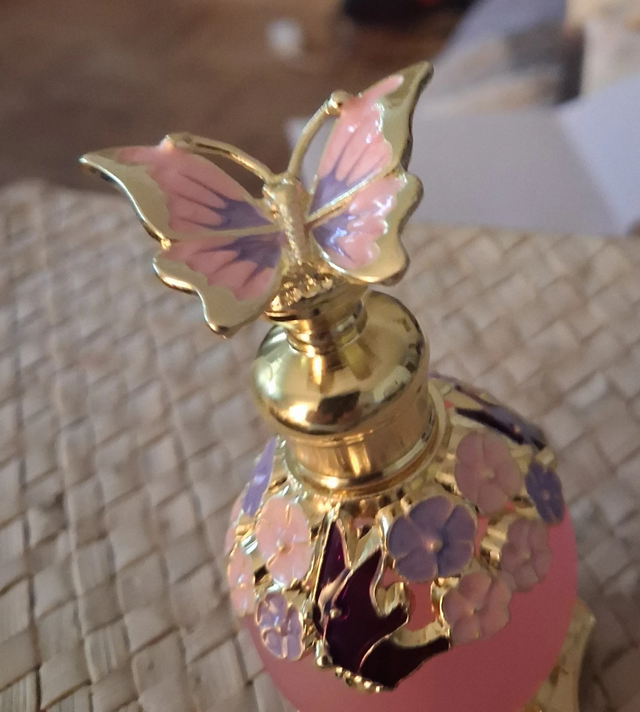 Decorative Perfume Bottle with Butterfly and Floral Accents