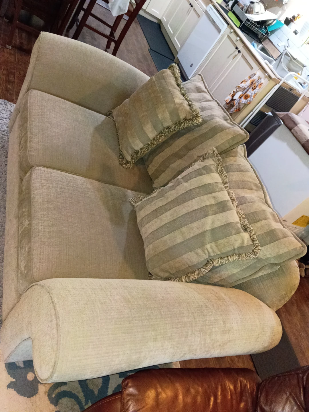 Light Beige Loveseat with Decorative Pillows