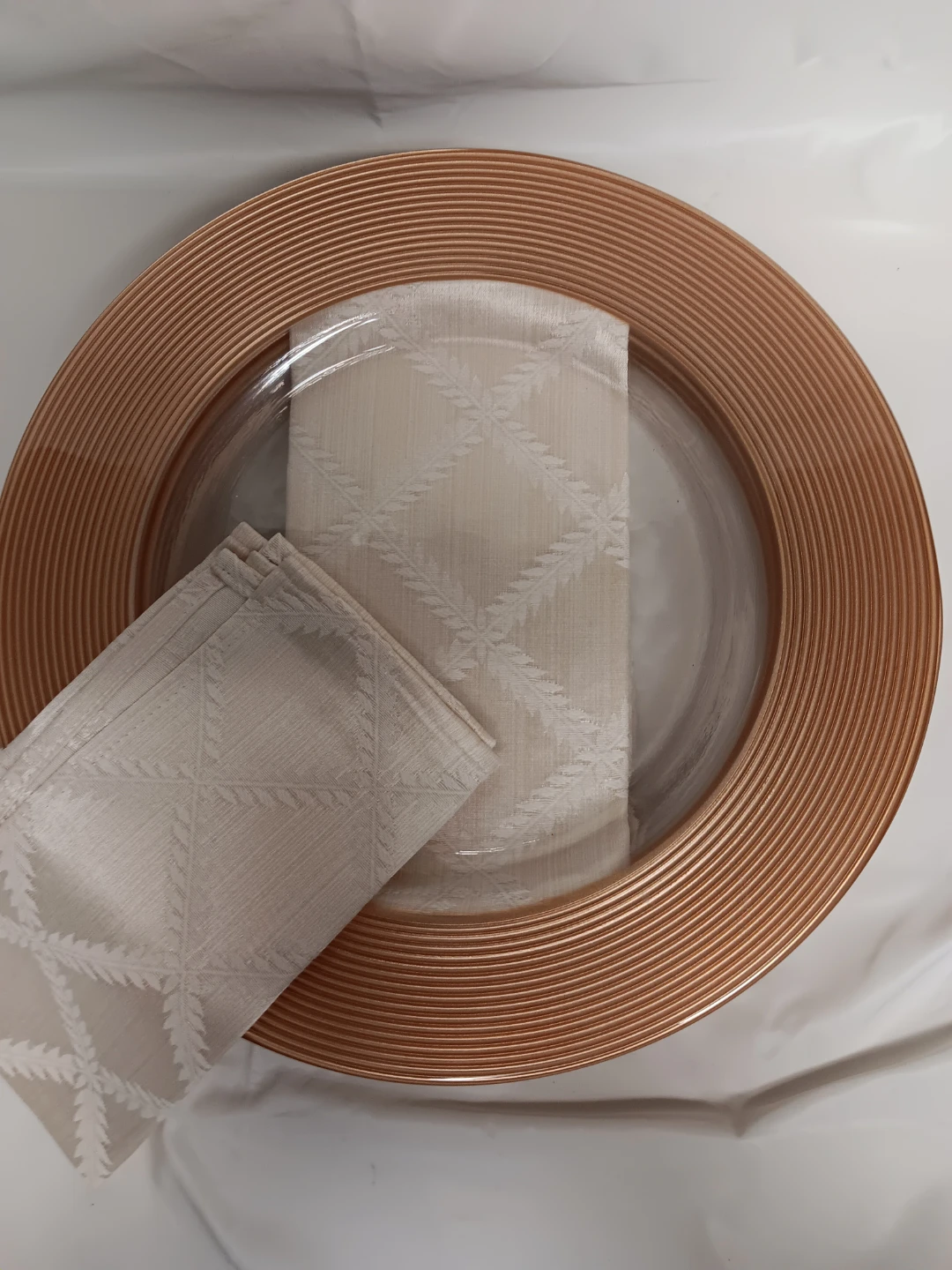 Set of 4 Rose Gold Charger Plates with Neutral Napkins