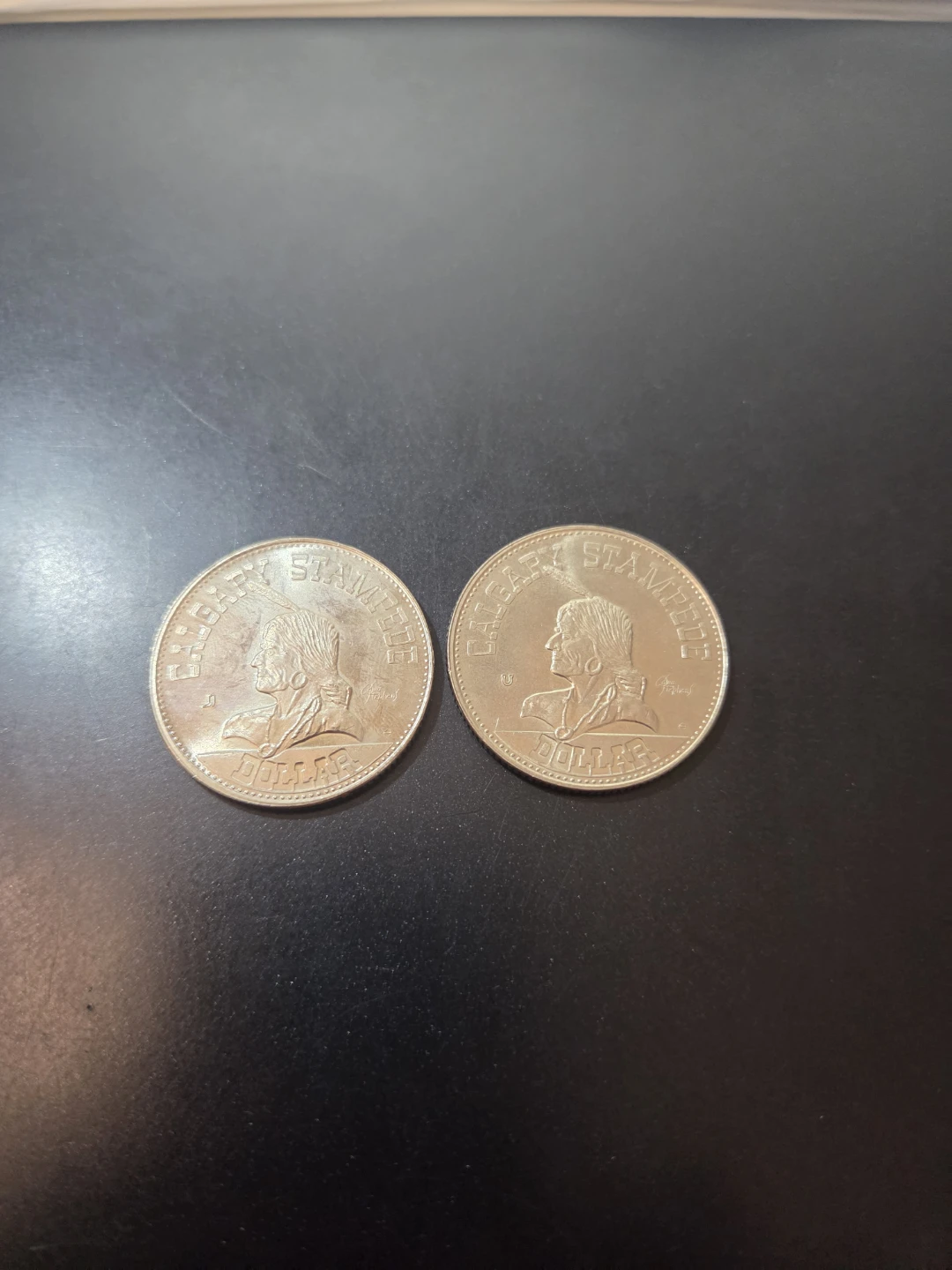 Two Calgary Stampede Dollars 1977