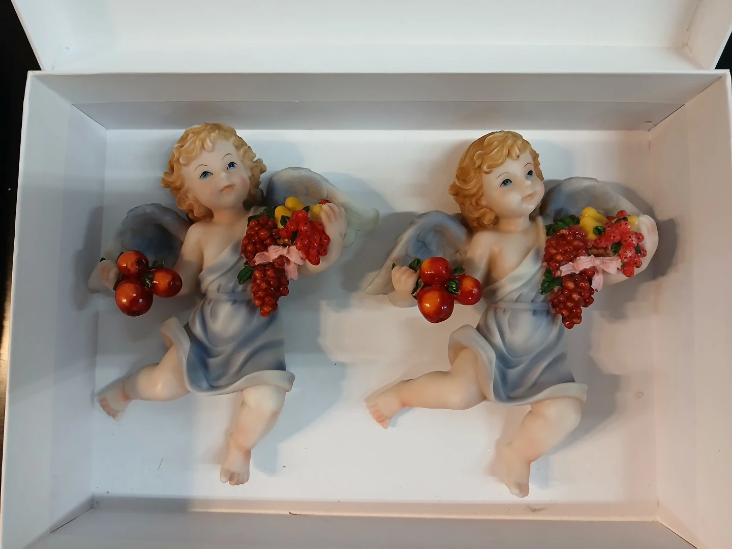 Pair of Cherub Figurines with Fruit
