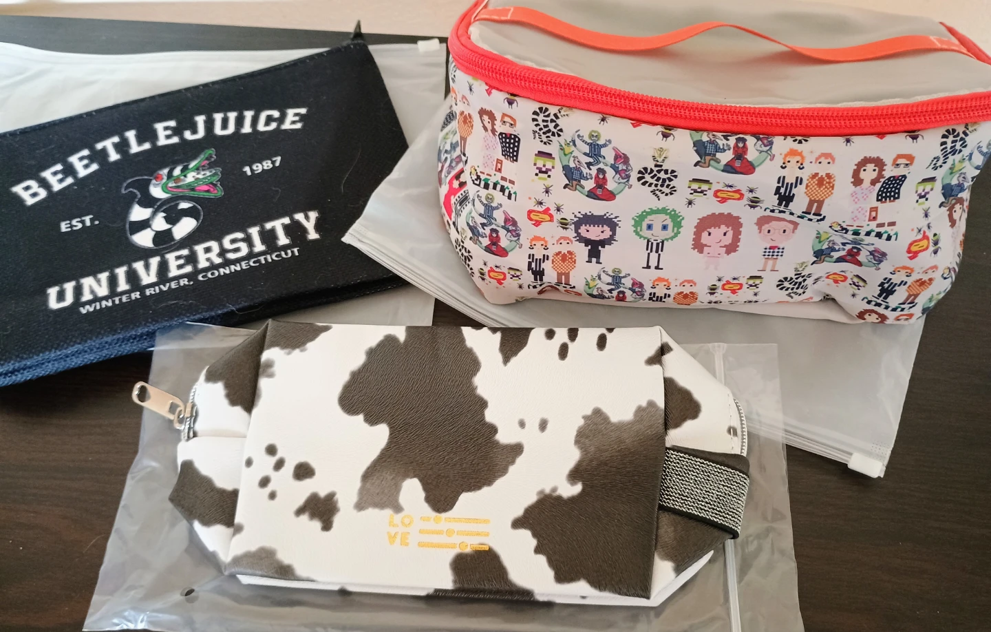 Beetlejuice University & Cow Print Cosmetic Bags