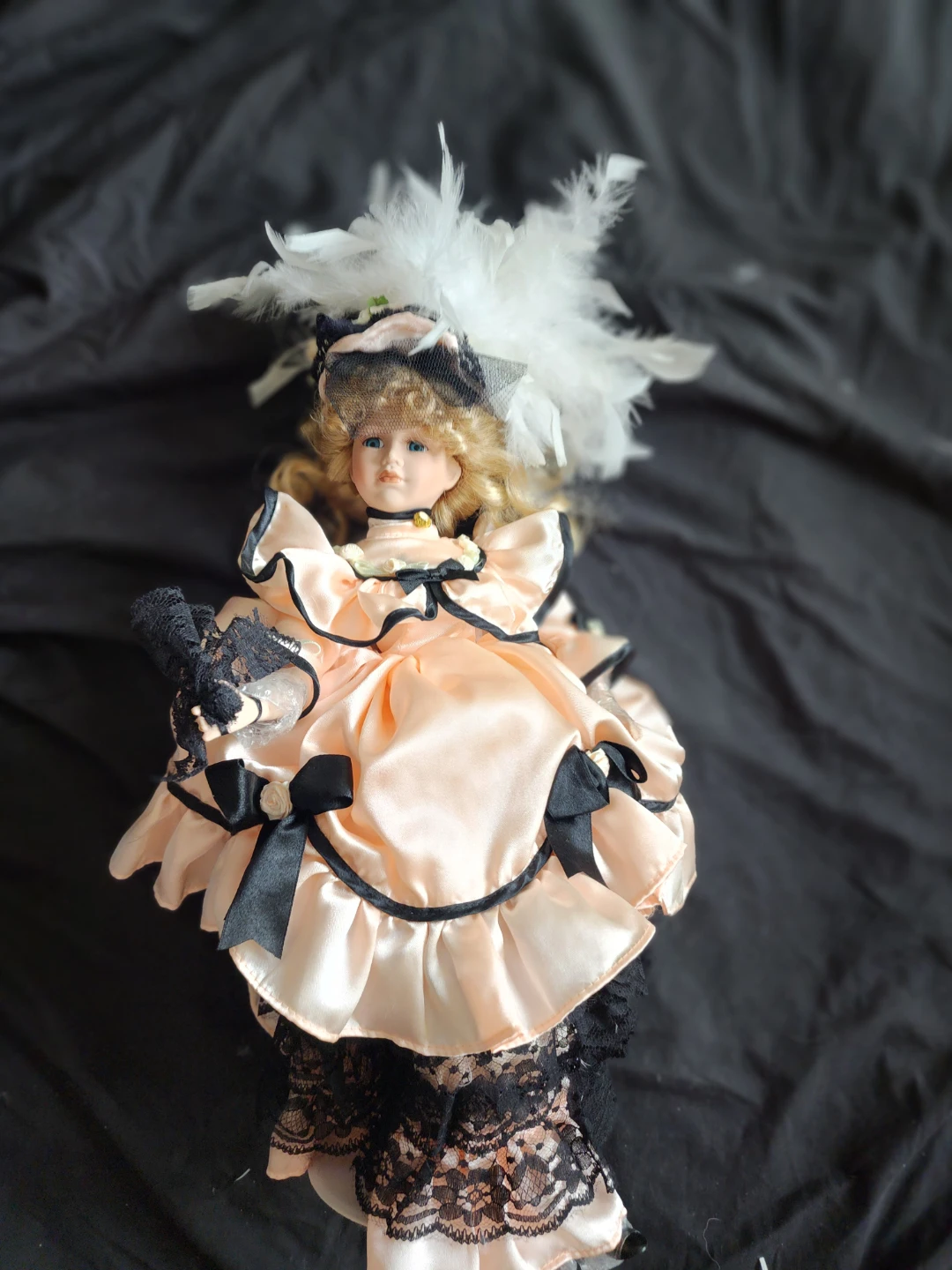 Victorian Style Porcelain Doll with Peach Dress and Feathers