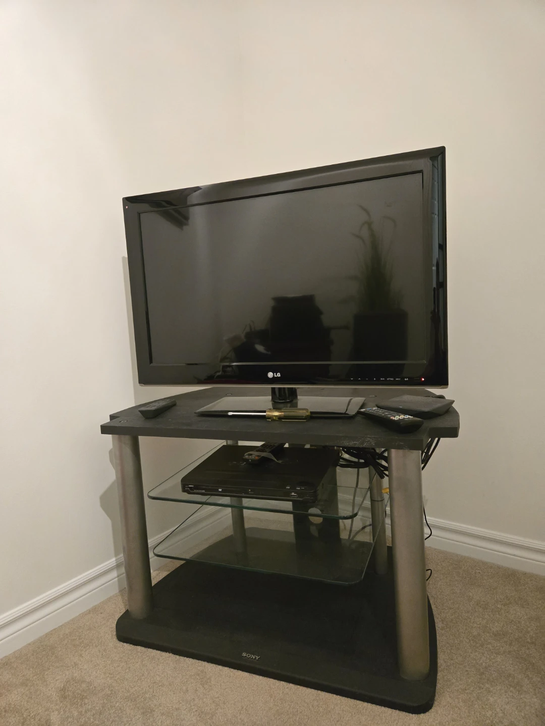 LG Television and Sony TV Stand Bundle