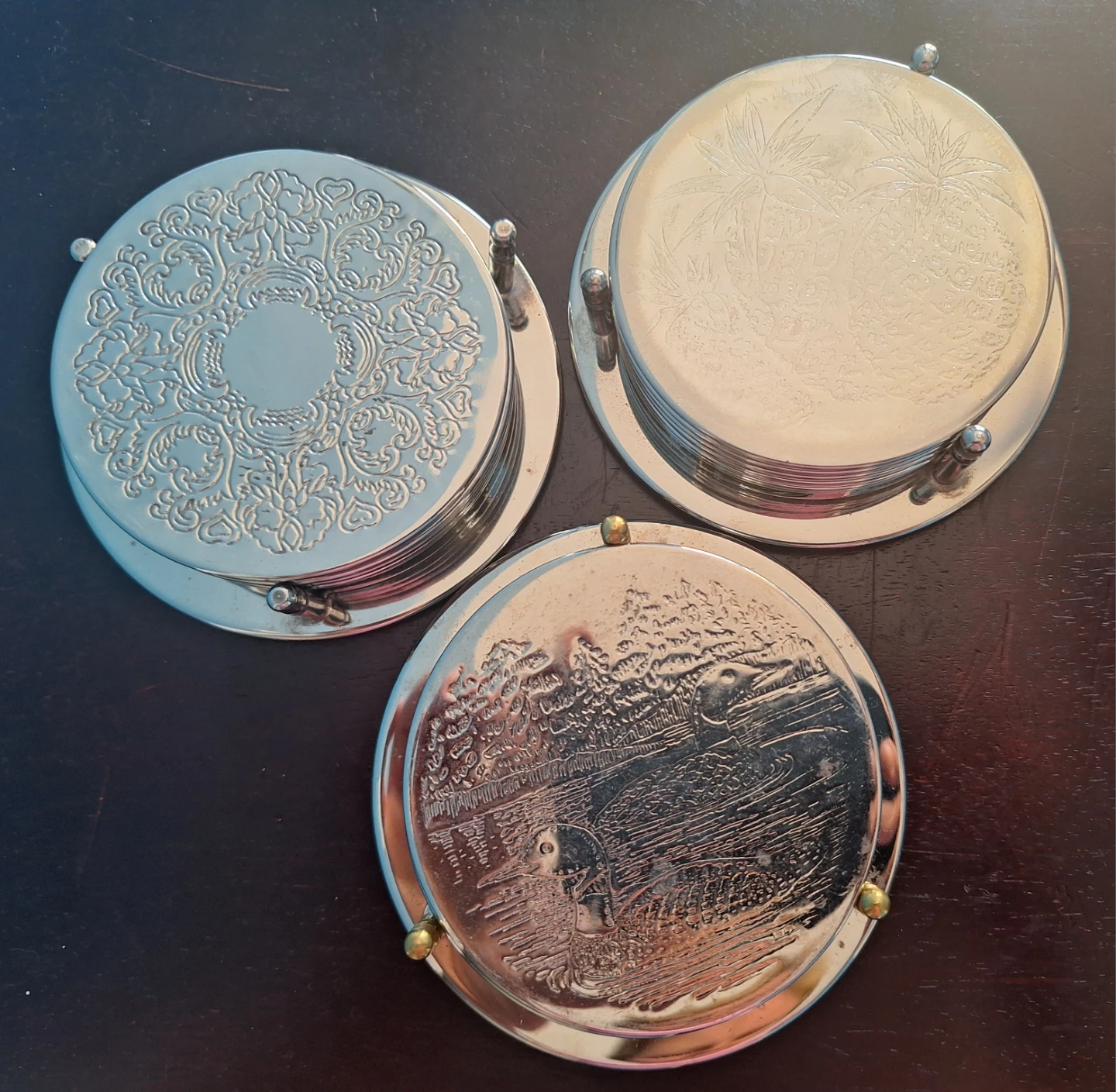 3 sets of vintage silver-plated coasters