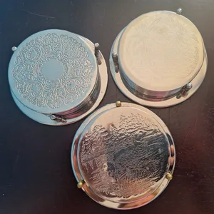 3 sets of vintage silver-plated coasters
