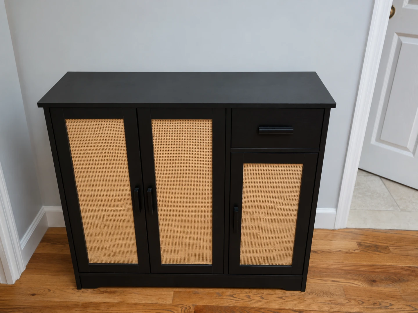 Black Accent Cabinet with Cane Doors and Drawer