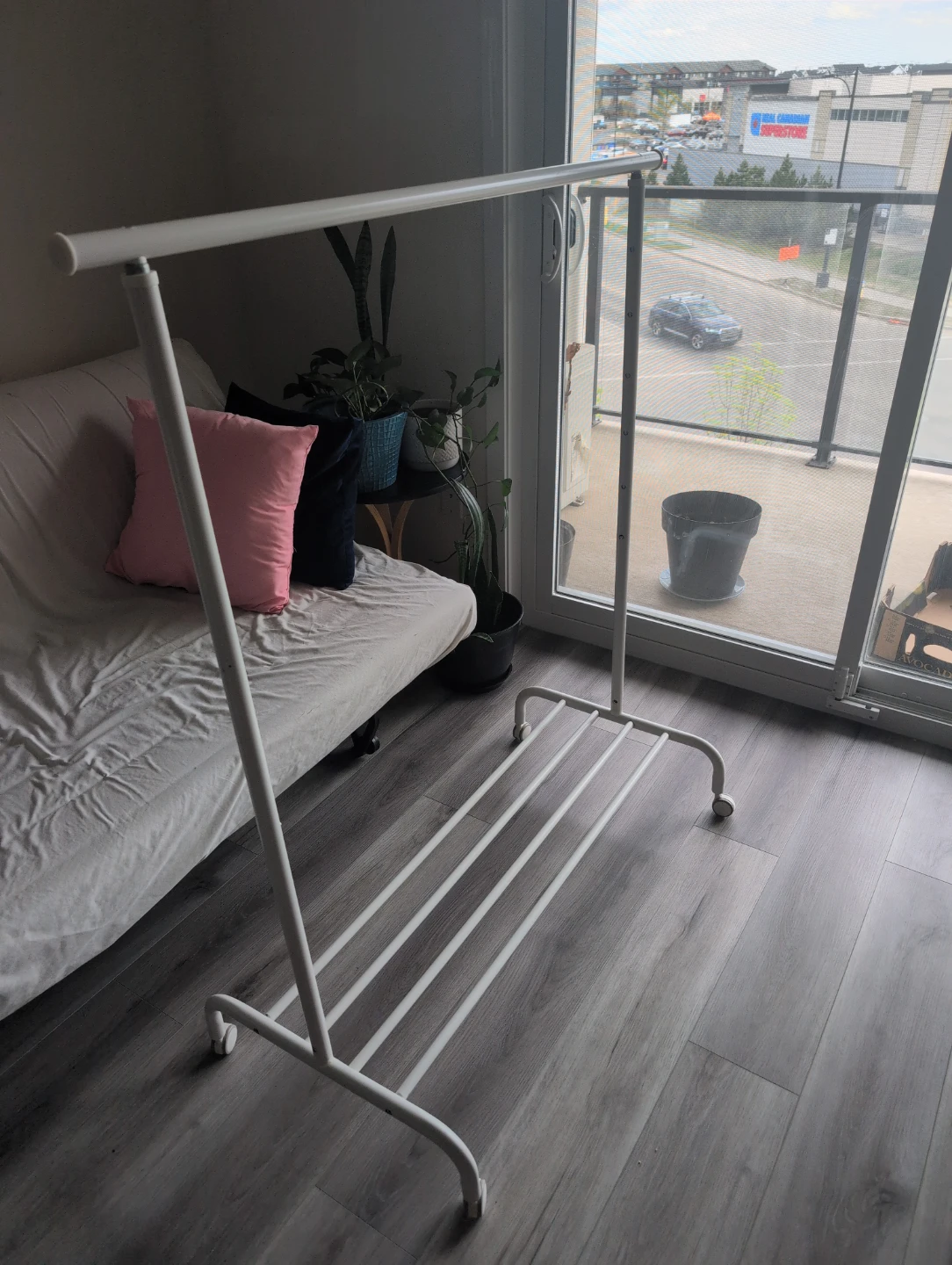 White Metal Clothes Rack with Wheels