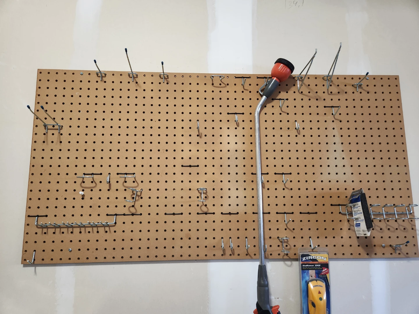 W/L 48" by 24" Pegboard with Assorted Hooks