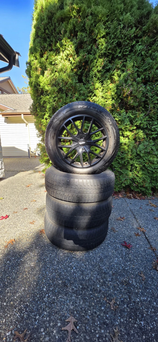Set of 4 Black 235/60R18 Tires with Rims