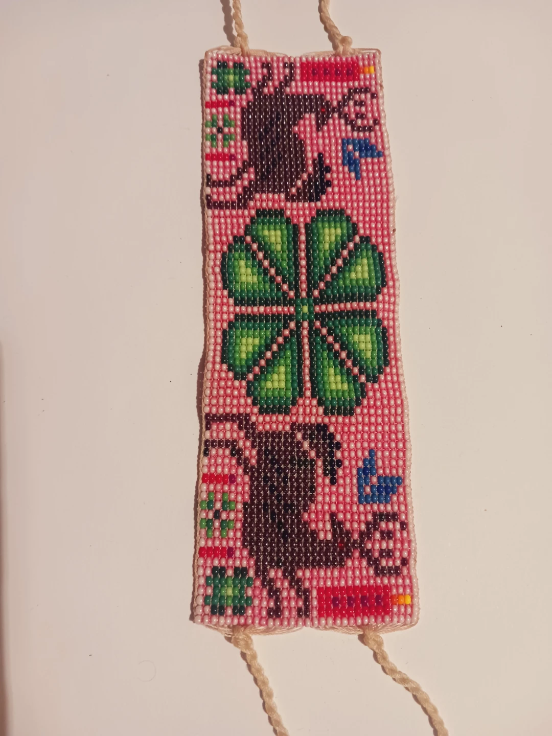 Handmade Beaded Bracelet with Clover and Deer Design
