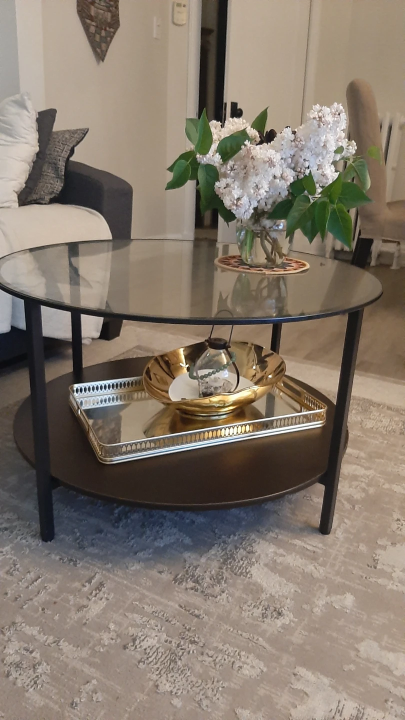 Two-tier round coffee table with glass top