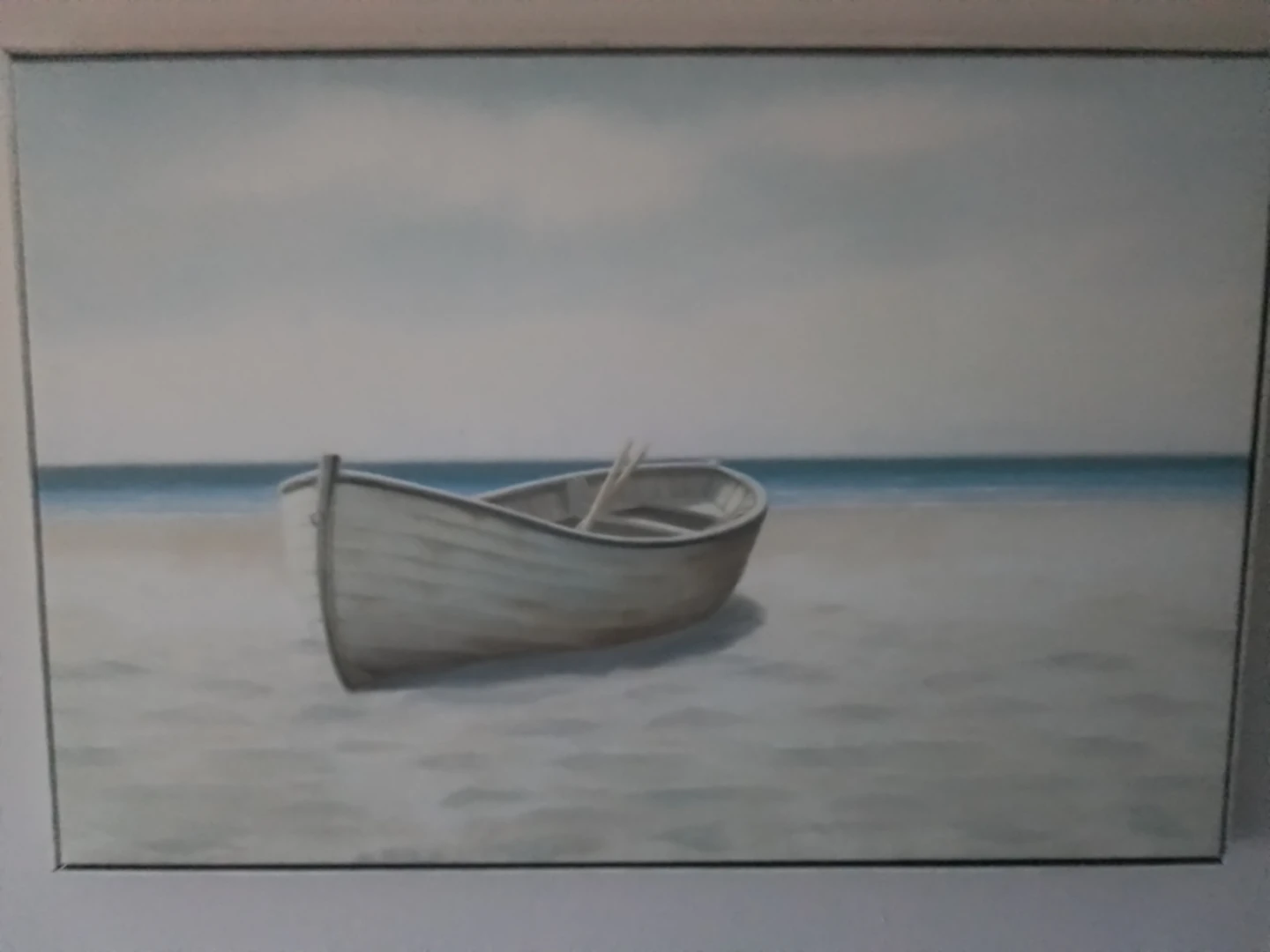 Framed Painting of a Rowboat on the Beach