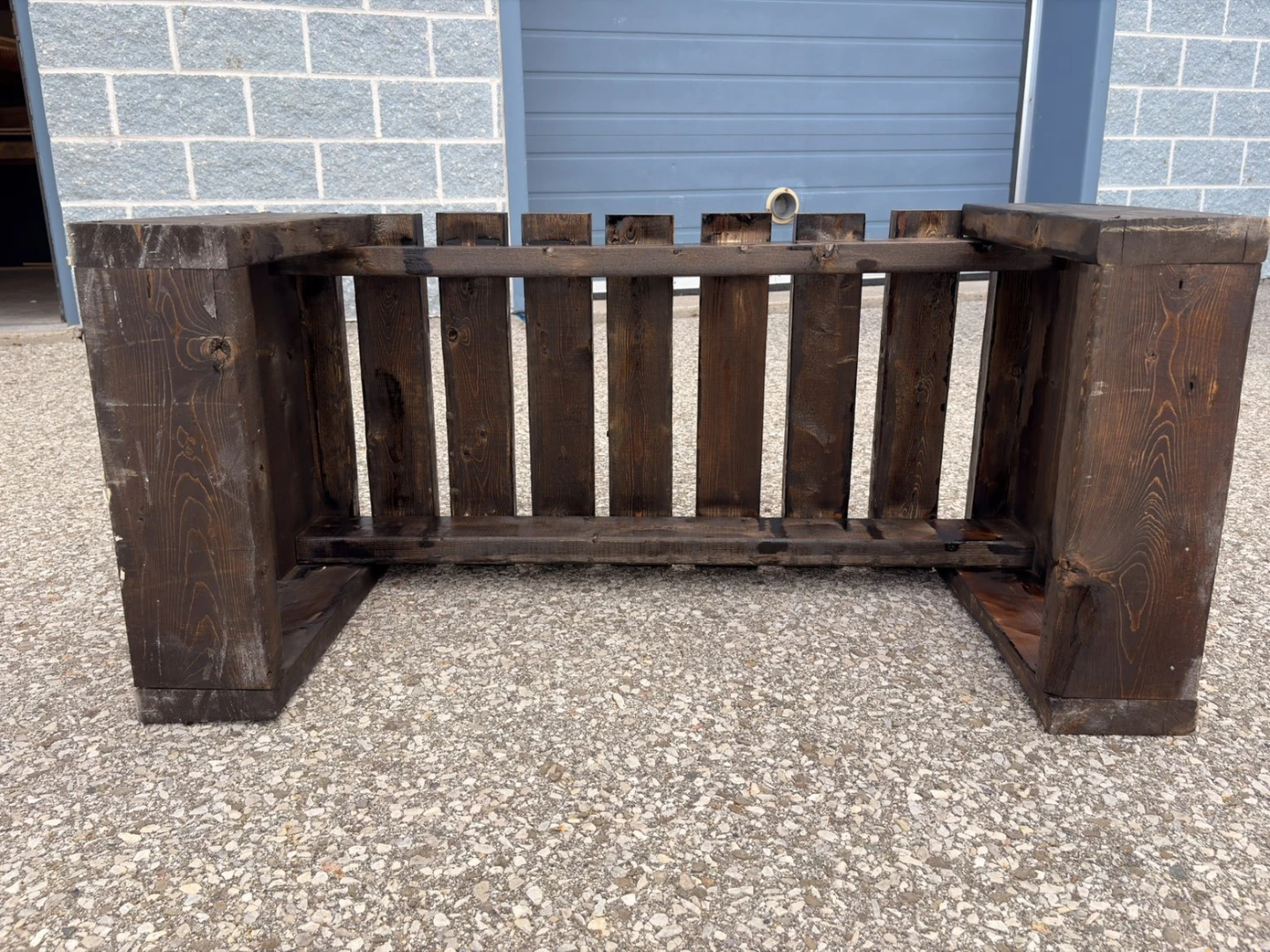Black bench made out of wood (hamdmade)