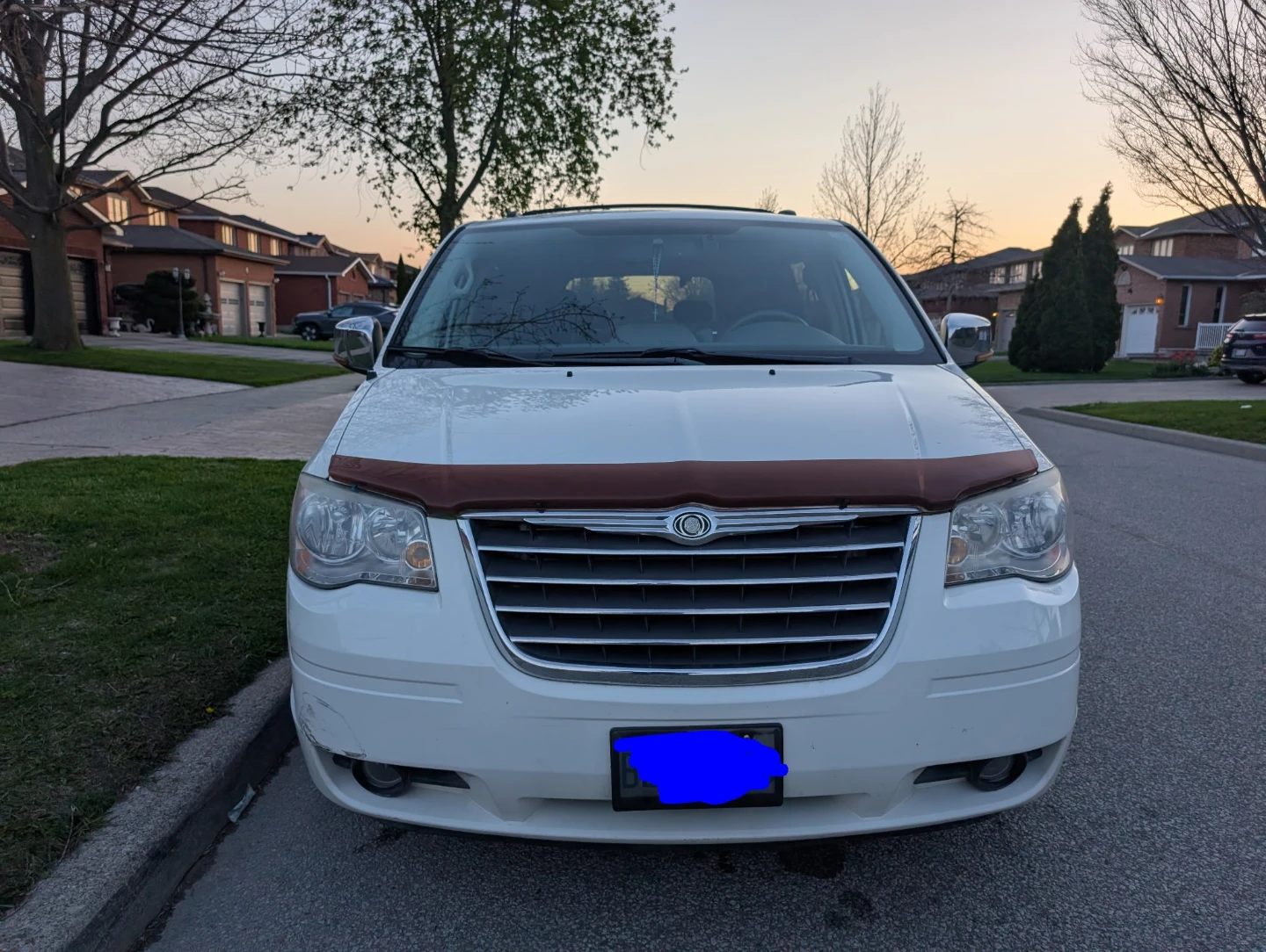 White Chrysler Town & Country Van
