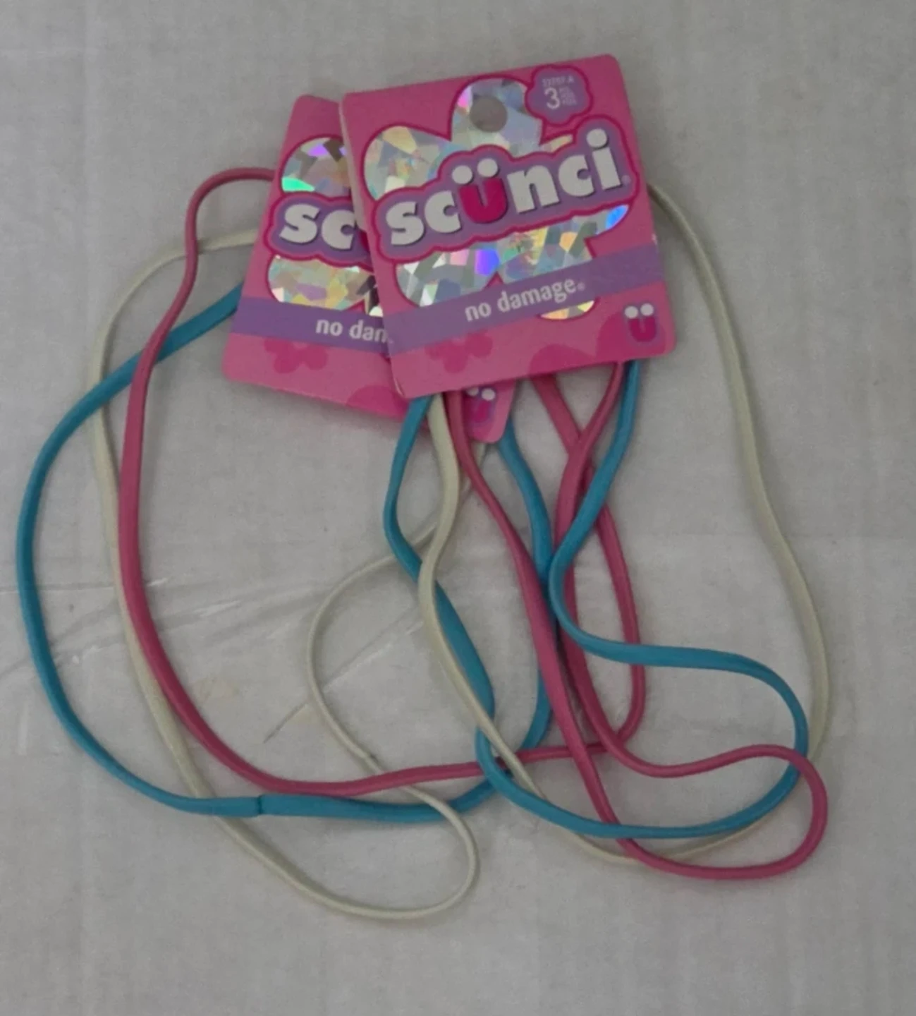 2 sets of Scunci Hair Elastics (Pink, Blue, White)
