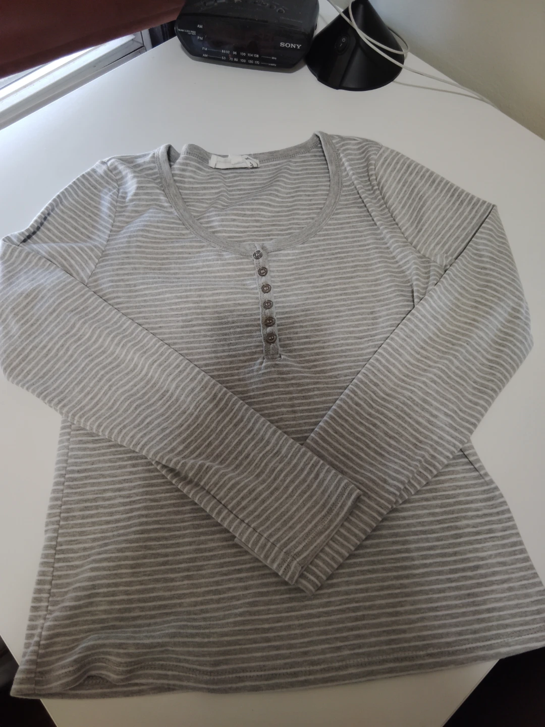 Grey and white long sleeve top