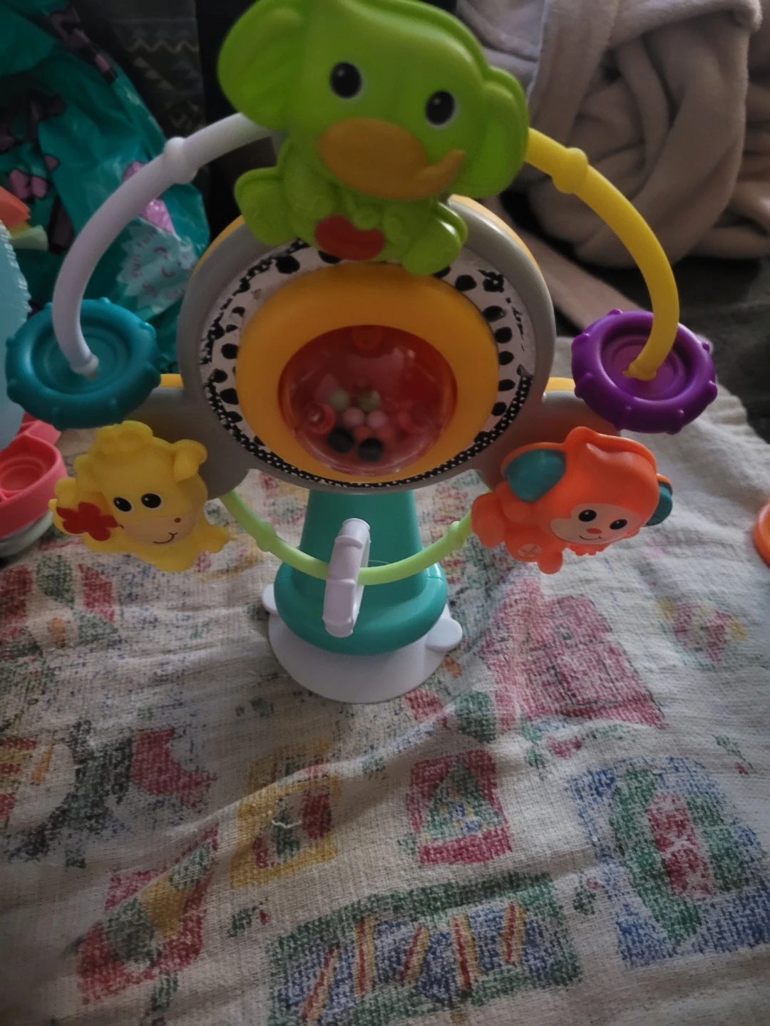 Infantino Jungle Ferris Wheel baby toy featuring animal friends.