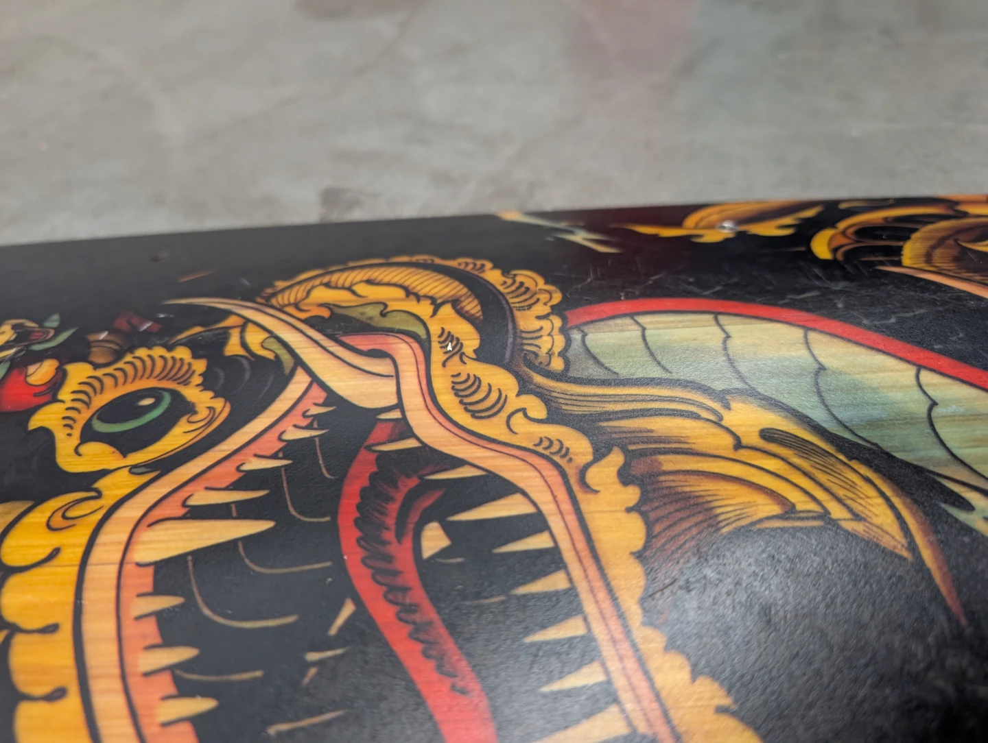 Rayne Longboard Deck with Dragon Graphic