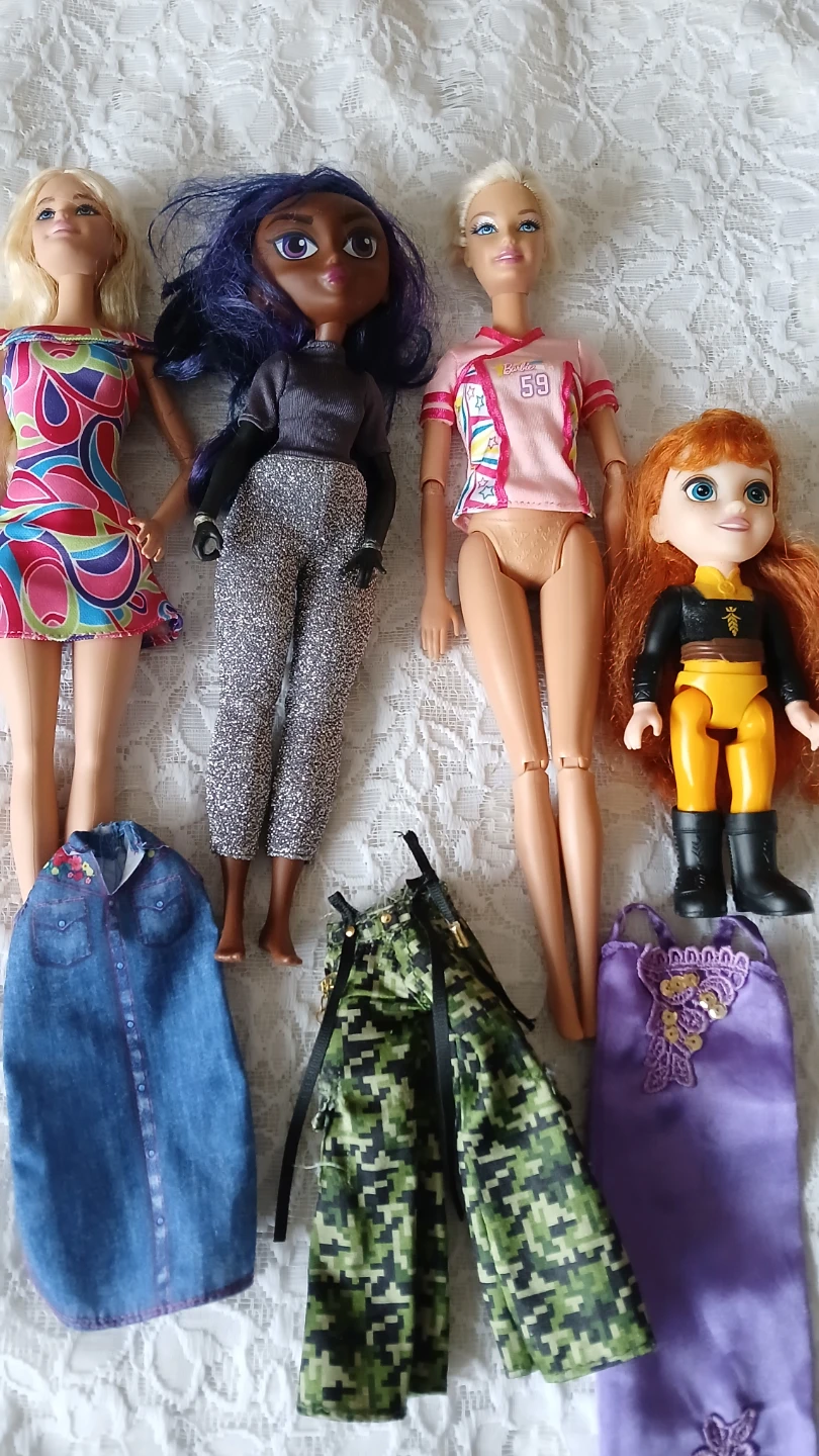 Collection of 4 dolls for $5.00