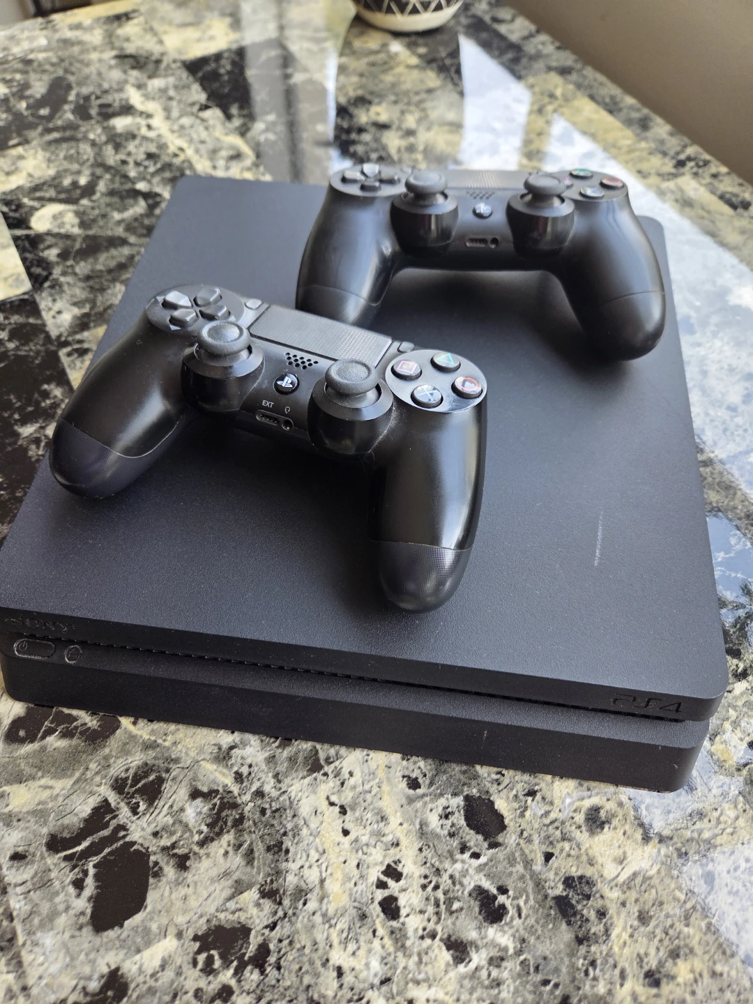 PS4 Slim + 2 Controllers + 3 Games + all necessary cables