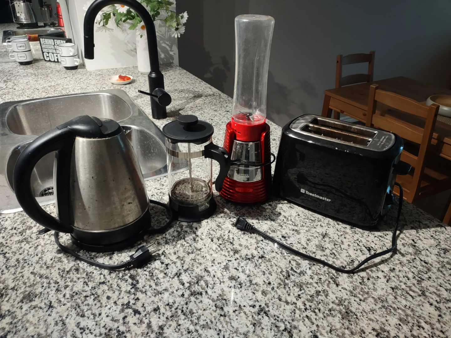 Kitchen appliances: kettle, toaster, blender, coffee press