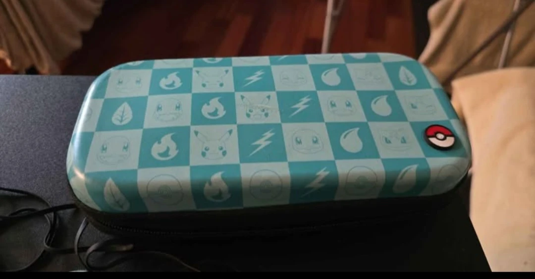 Nintendo Switch Lite Turquoise with Pokemon Case and Accessories