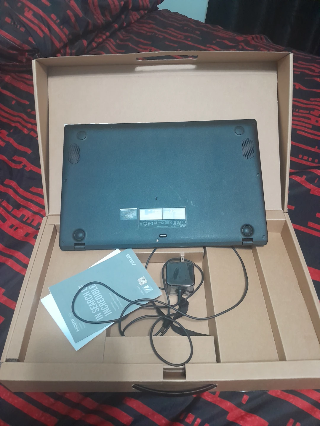 ASUS Laptop with Charger and Manual - photo 2
