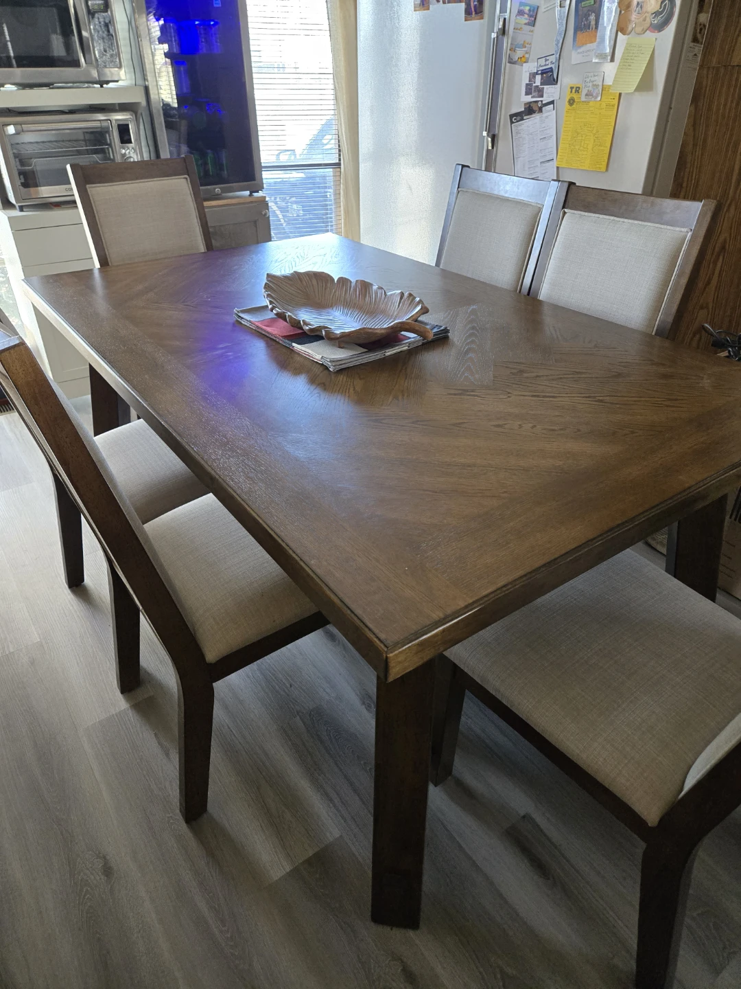 Wood table with 6 chairs. Barely used