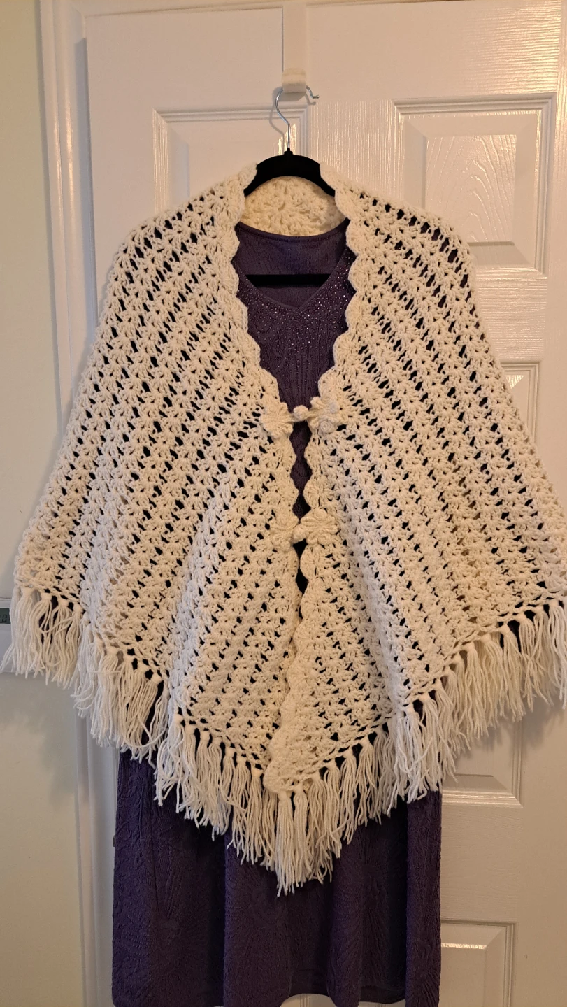 Cream Crochet Poncho with Fringe and Flower Details