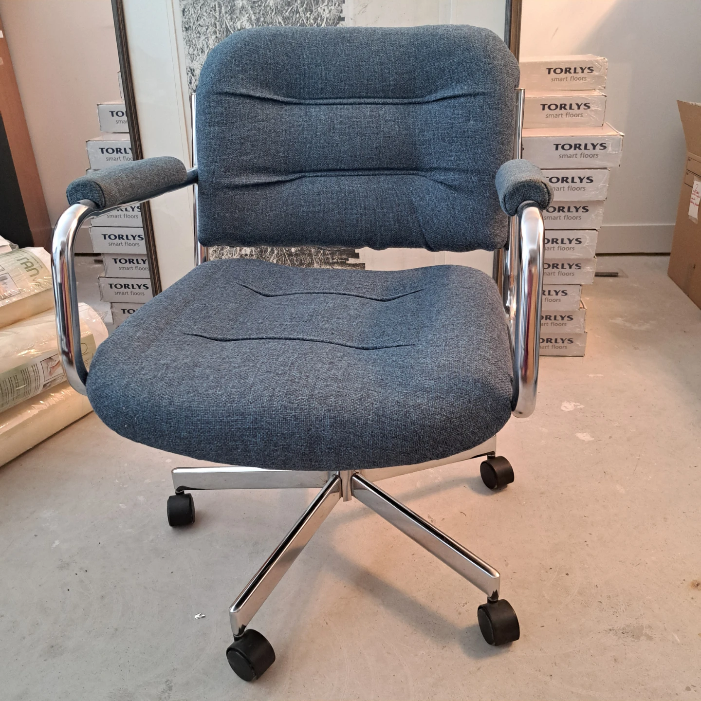 Set of 4. 3 Blue Fabric Armchairs and 1 Rolling Desk chair