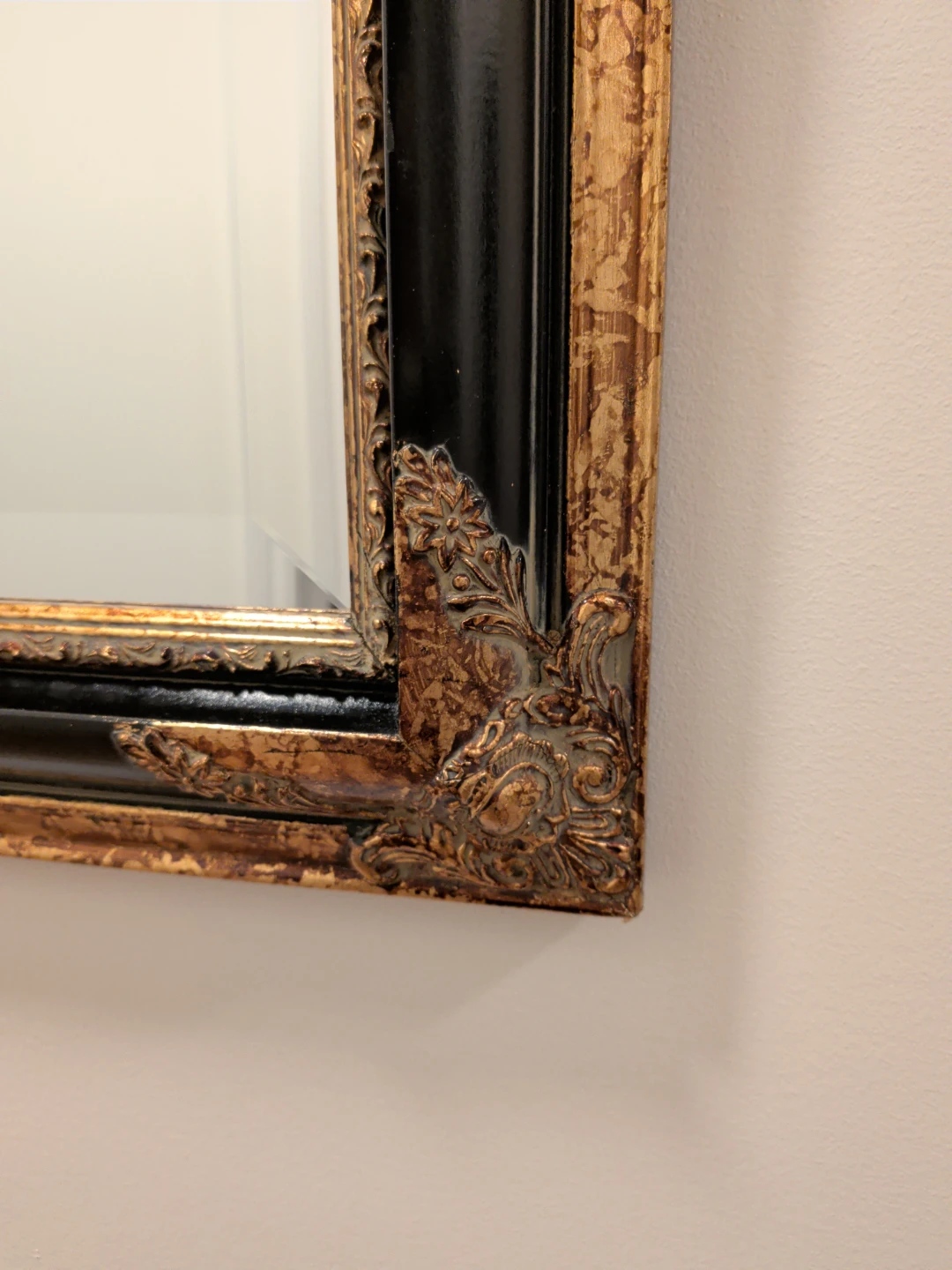 Ornate Gold and Black Framed Mirror